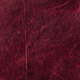 Close-up of maroon vegetable-tanned leather.